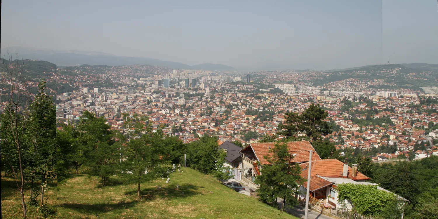 Sarajevo in its valley, the old town beneath the surrounding hills